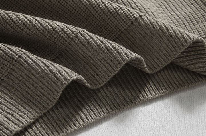 Strickpullover mit Halbreißverschluss am Kragen